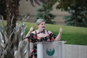 Abbie Wagaman photo spaeking at podium