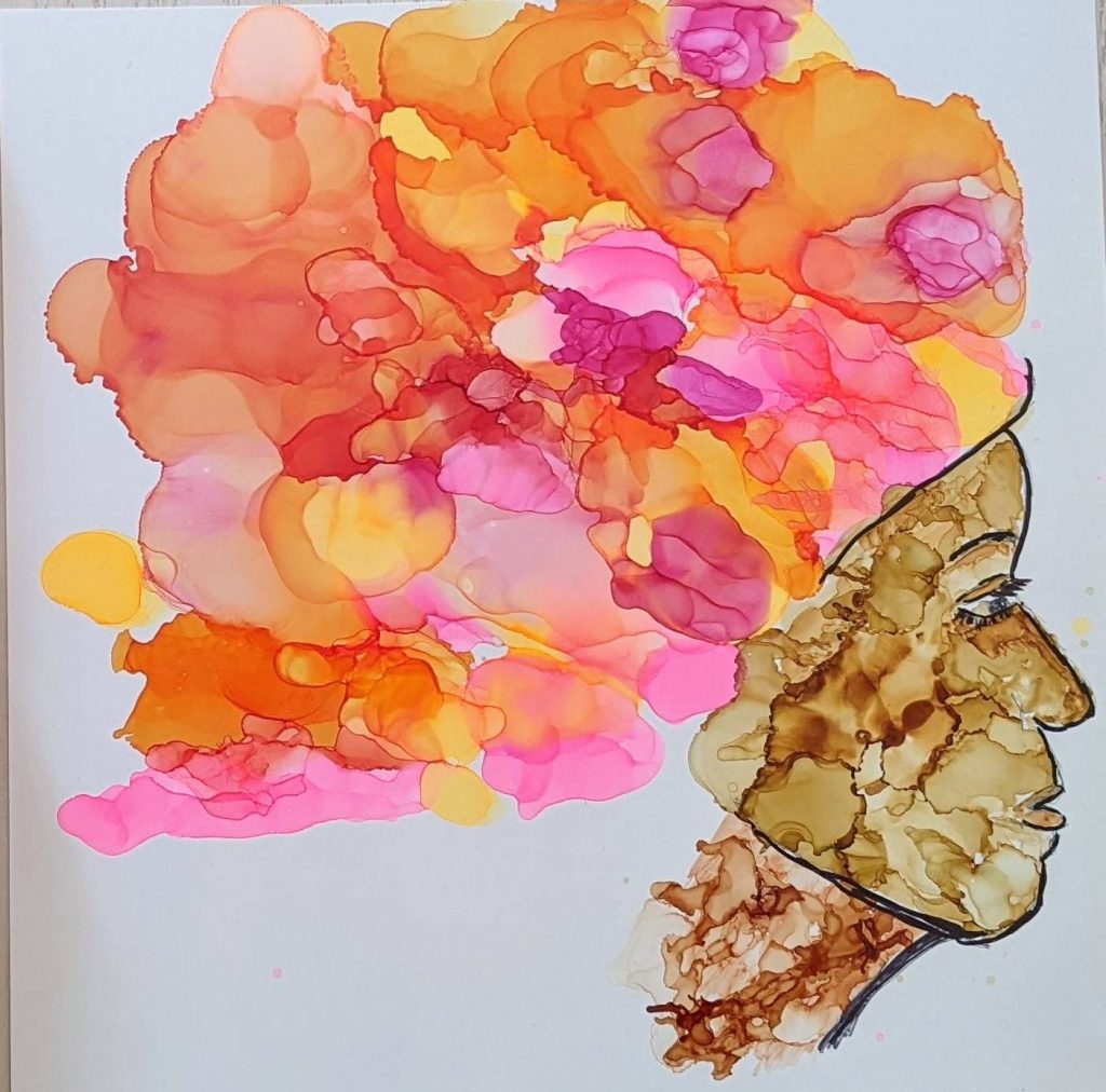 Watercolor image of a woman's profile from the neck up. Her head/hair has a mix of oranges, pinks, and yellows extending from her head.